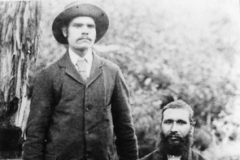 Sam Isaacs, seated, shown with son Fred